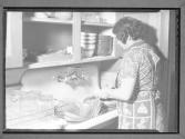 [Woman Washing Dishes]