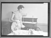 [Woman Serving Coffee]