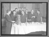 [Men at a Social Tea]