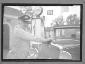 [Esso Station Attendent]