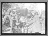 [Firemen with Truck]