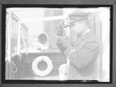 Ship Captain Holding Sextant