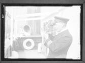 Ship Captain Holding Sextant