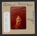 [Nicholas Christopher Muray swimming (travel slide)]
