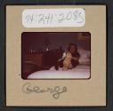 [Peggy Muray and her cat George (travel slide)]