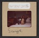 [Peggy Muray and her cat George (travel slide)]