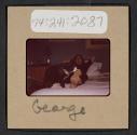 [Peggy Muray and her cat George (travel slide)]