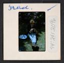 [Person at a graduation (travel slide)]