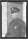 [Portrait of Policeman Badge Number 10086]