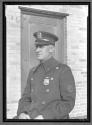 [Portrait of Policeman Badge Number 10086]