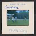 [People playing soccer (travel slide)]