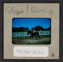 [Nicholas Christopher Muray riding a horse (travel slide)]