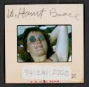 [Mimi Muray lying on a beach, West Hampton, New York (travel slide)]