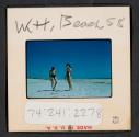 [Nicholas Christopher and Mimi Muray on a beach, West Hampton, New York (travel slide)]