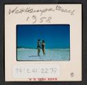 [Nicholas Christopher and Mimi Muray on a beach, West Hampton, New York (travel slide)]