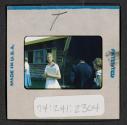 [People standing outside (travel slide)]
