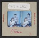 [Nicholas Christopher and Mimi Muray playing cards (stereo travel slide)]