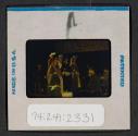 [People seated indoors (travel slide)]