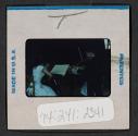 [An orchestra performing (travel slide)]