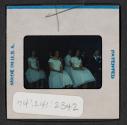 [People seated in formal wear (travel slide)]