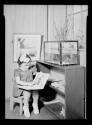 [Child with Picture Book]