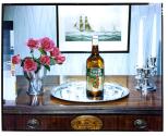 [Liquor bottle with glasses (Four Roses)]