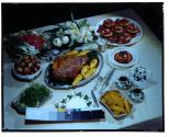 [Dinner spread on table (advertisement)]