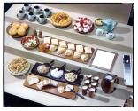 [Three tiers of food (advertisement)]
