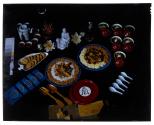 [Dishes of food on table (advertisement)]