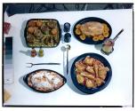 [Dishes of food on table (advertisement)]