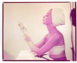 [Woman holding soap]