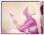 [Woman holding soap]
