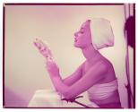 [Woman holding soap]