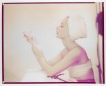 [Woman holding soap]