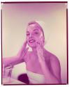[Woman washing her face]