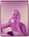 [Woman washing her face]
