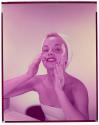 [Woman washing her face]
