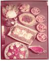 [Dishes of food on table]