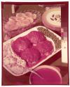[Dishes of food on table]