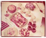 [Dishes of food on table]