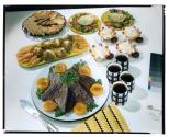 [Dishes of food on table (advertisement)]
