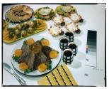 [Dishes of food on table (advertisement)]
