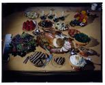 [Stuffed turkey and side dishes on table (advertisement)]