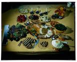[Stuffed turkey and side dishes on table (advertisement)]