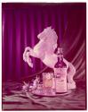 [Liquor bottle, glass, and horse statue (White Horse Cellar)]