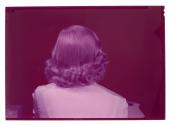 [Back of a woman's head]