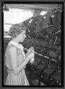 [Woman with Spools]
