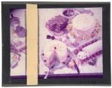 [Table of decorated cakes and ingredients]