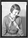 [Girl Scout with stuffed toy]