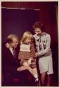 [President and Mrs. Carter and daughter Amy preparing for a Family Portrait]
